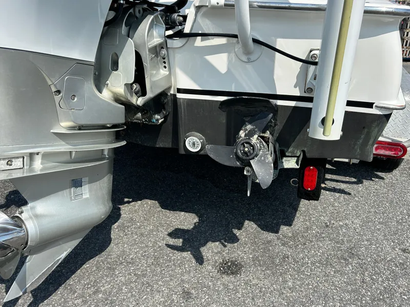 Slide: The Image of Close-up of a 2002 Bayshore Carolina Flats 20 boat motor and propeller. - 4