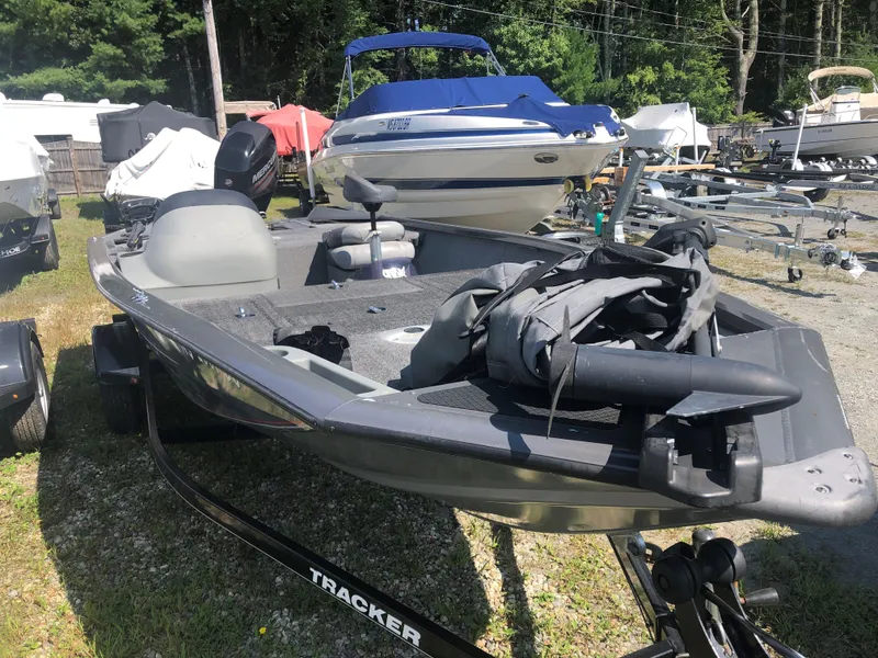 Slide: The Image of 2014 Tracker Pro Team 175 TF boat in outdoor storage area. - 6
