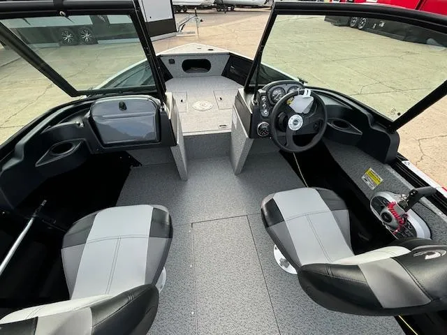 Slide: The Image of Interior of 2025 Crestliner 1650 Kodiak boat with dual seats and steering console. - 10