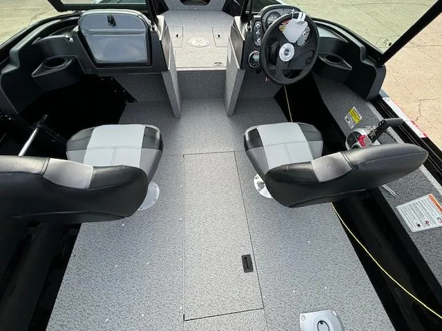 Slide: The Image of Interior of 2025 Crestliner 1650 Kodiak boat with two seats and steering console. - 8