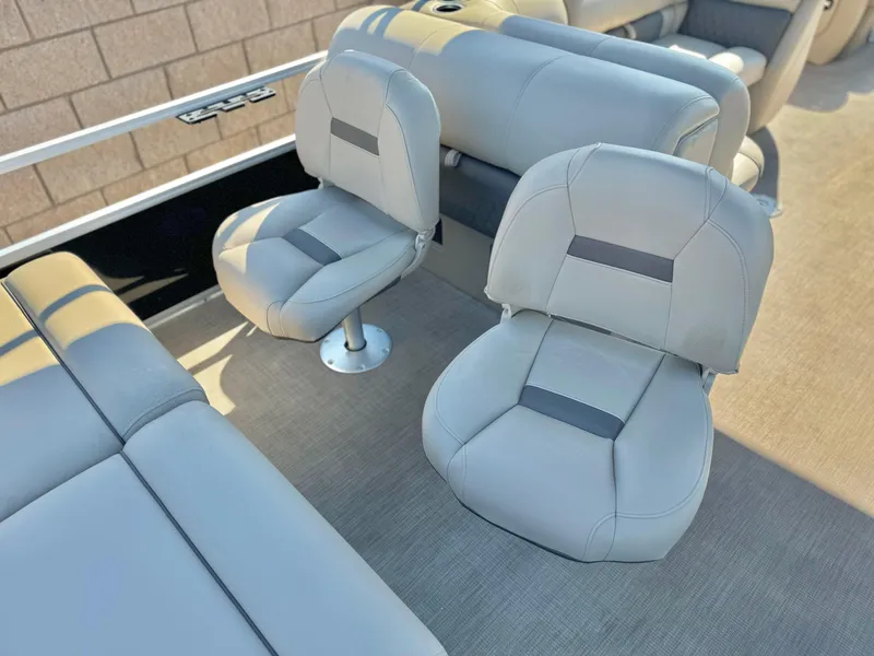 Slide: The Image of 2023 Sun Tracker Sport Fish 22 DLX boat interior with comfortable seating. - 18