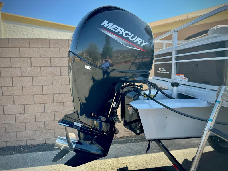 Slide: The Image of 2023 Sun Tracker Sport Fish 22 DLX with Mercury outboard motor. - 8