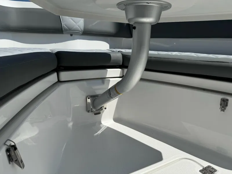 Slide: The Image of 2025 NauticStar 242L Offshore boat interior, featuring sleek seating and modern design elements. - 26