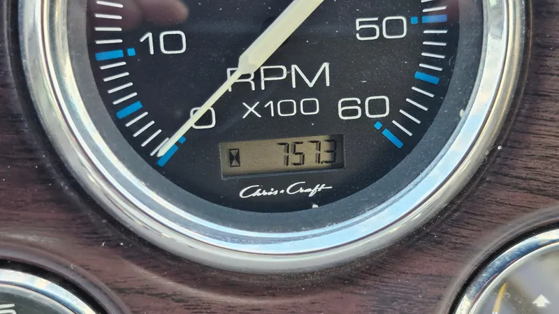 Slide: The Image of Tachometer of 2000 Chris-Craft 328 Express Cruiser showing 757.3 RPM. - 35