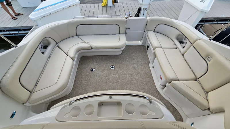 Slide: The Image of Luxurious seating area on 2000 Chris-Craft 328 Express Cruiser boat. - 7