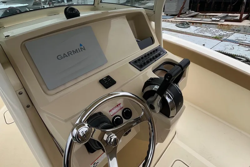 Slide: The Image of 2018 Scout 255 LXF boat dashboard with Garmin navigation system. - 7