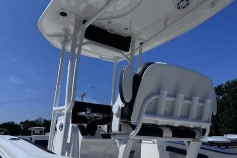 Slide: The Image of 2025 Tidewater 210 CC Adventure boat, featuring sleek design and modern seating. - 1