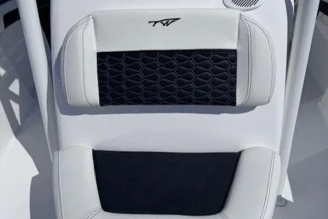 Slide: The Image of 2025 Tidewater 210 CC Adventure boat seat with black and white upholstery. - 13