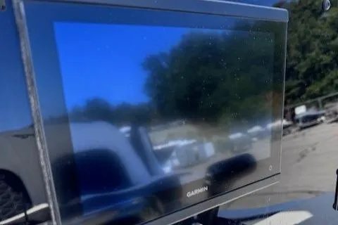 Slide: The Image of Garmin display on 2025 Tidewater 210 CC Adventure boat, reflecting outdoor scenery. - 3