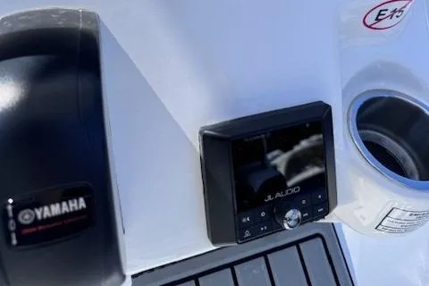 Slide: The Image of Yamaha control panel and JL Audio system on 2025 Tidewater 210 CC Adventure boat. - 5