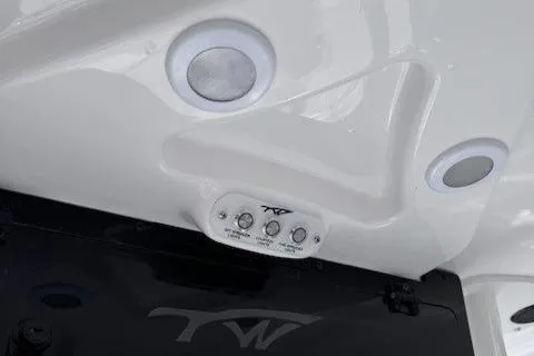 Slide: The Image of 2025 Tidewater 210 CC Adventure boat interior with control panel and speakers. - 6