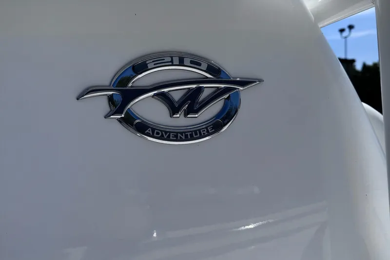 Slide: The Image of 2025 Tidewater 210 CC Adventure logo on white surface. - 9