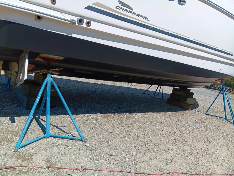 Slide: The Image of 2004 Chaparral Signature 350 boat on stands for maintenance. - 28