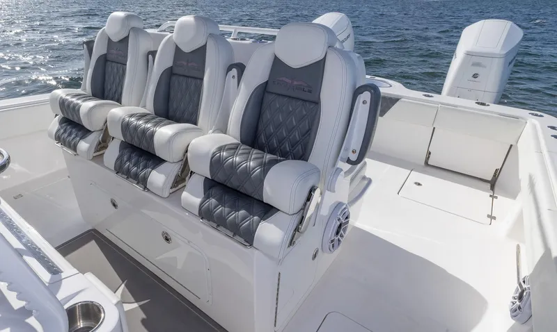 Slide: The Image of Luxury seating on 2023 Invincible 35 Catamaran, featuring plush, ergonomic design. - 17