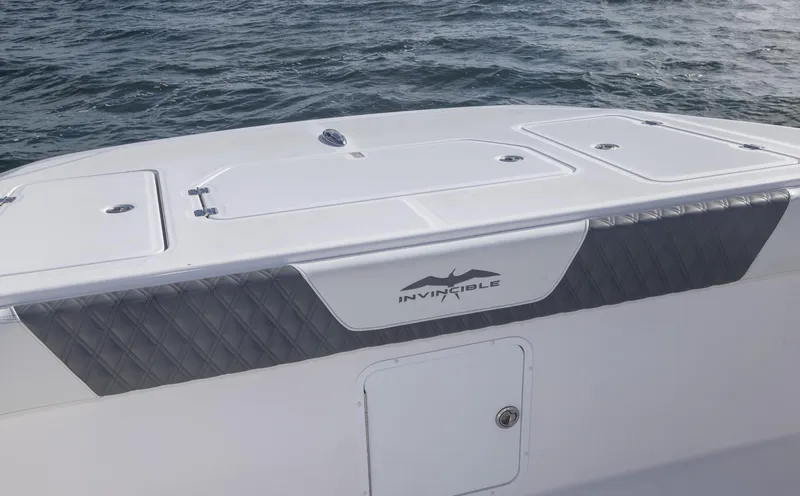 Slide: The Image of 2023 Invincible 35 Catamaran deck view on open water. - 8