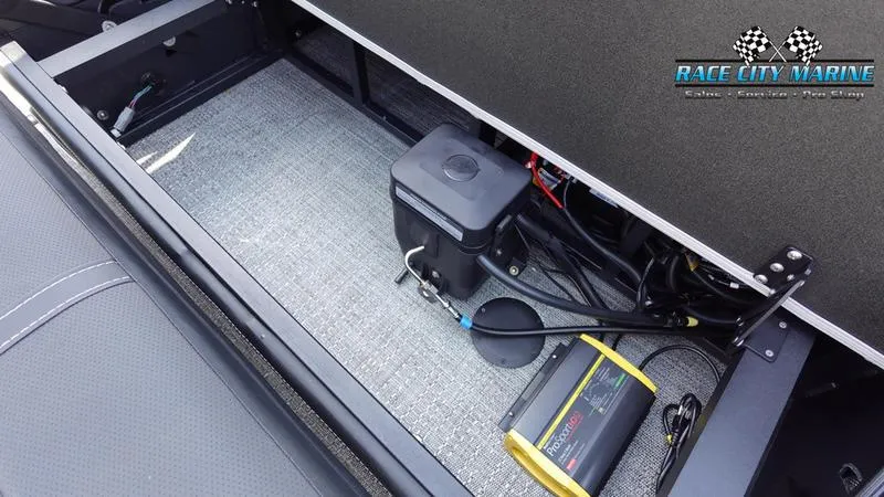 Slide: The Image of Barletta X23U 2025 boat interior with battery compartment and wiring, Race City Marine logo. - 30