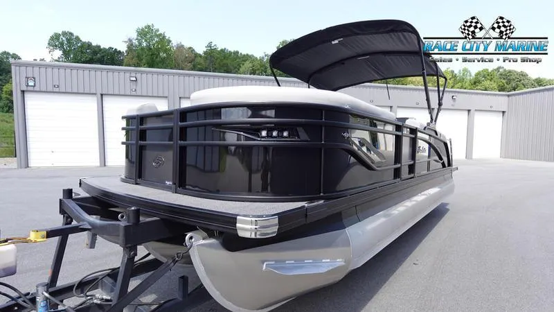 Slide: The Image of 2025 Barletta X23U pontoon boat on trailer at Race City Marine. - 5