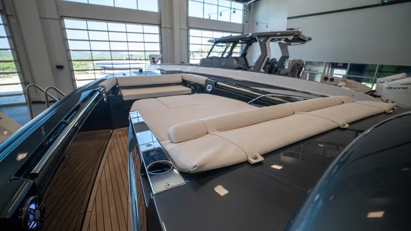 Slide: The Image of 2025 Pirelli TecnoRib 42 OB luxury boat interior with sleek design and comfortable seating. - 16