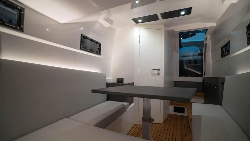 Slide: The Image of Interior of 2025 Pirelli TecnoRib 42 OB, featuring modern seating and sleek design. - 18