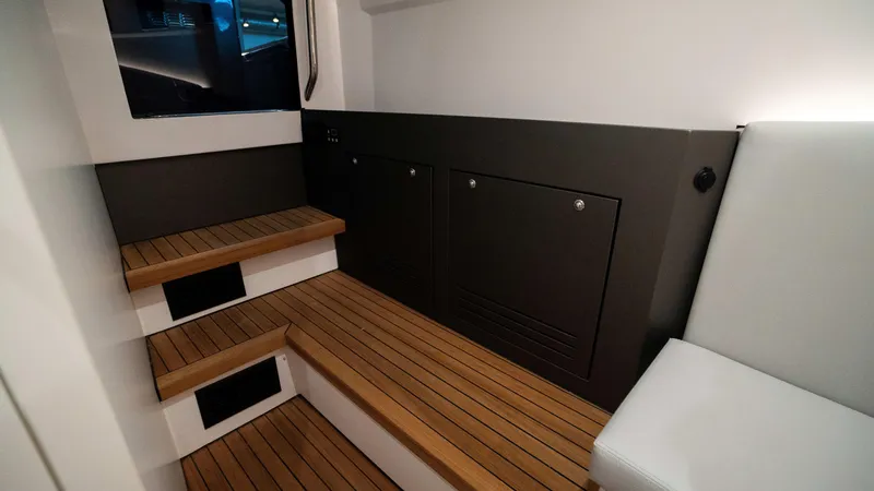 Slide: The Image of Interior of 2025 Pirelli TecnoRib 42 OB with wooden steps and seating. - 20