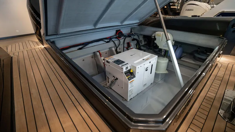 Slide: The Image of Pirelli TecnoRib 42 OB 2025 boat engine compartment with equipment and wiring. - 24