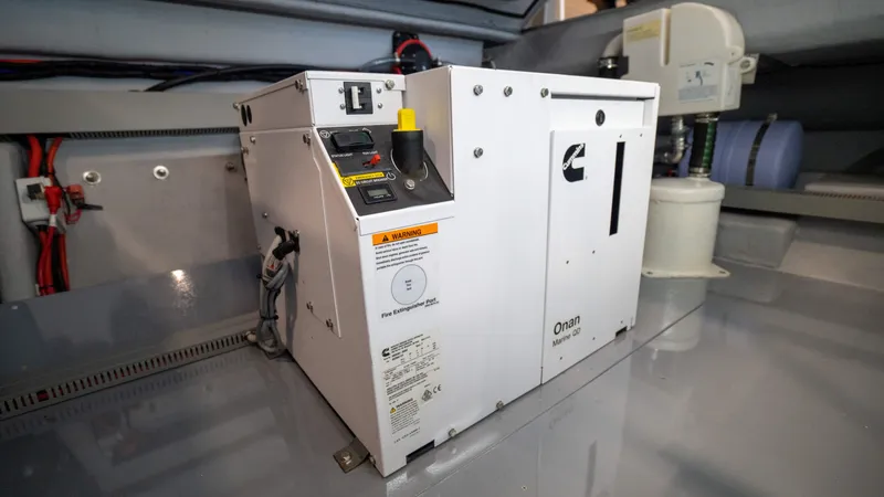 Slide: The Image of Cummins Onan generator in 2025 Pirelli TecnoRib 42 OB boat engine room. - 25