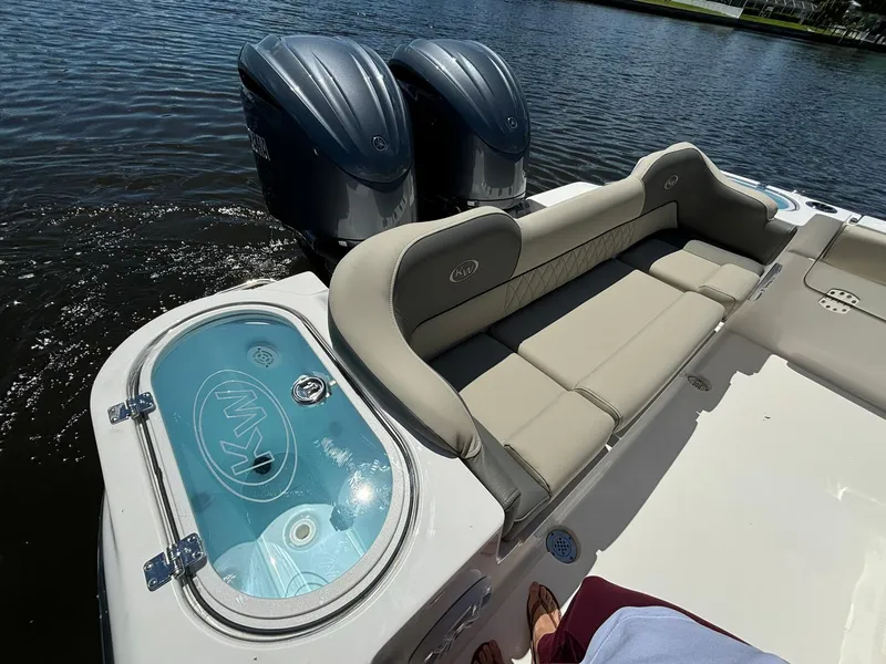 Slide: The Image of 2025 Key West 263 FS boat with dual engines and comfortable seating. - 8