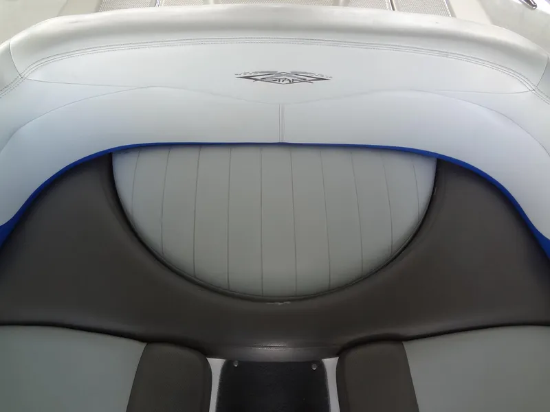 Slide: The Image of 2004 MasterCraft X-Star boat interior with gray and blue upholstery. - 13