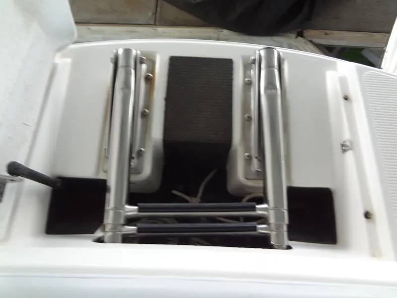 Slide: The Image of 2004 MasterCraft X-Star boat ladder and platform detail. - 14