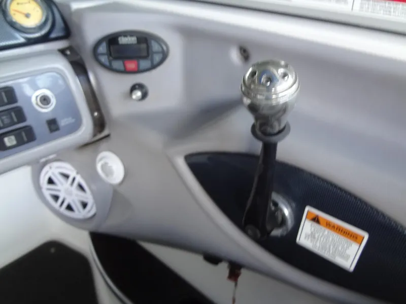 Slide: The Image of 2004 MasterCraft X-Star boat dashboard with controls and speaker. - 24