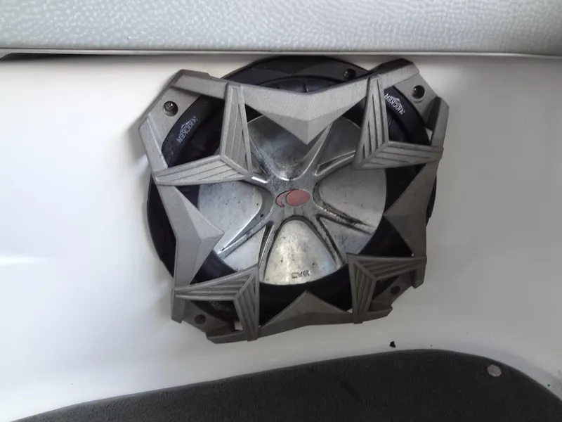 Slide: The Image of 2004 MasterCraft X-Star boat speaker with a stylish metallic grille design. - 29