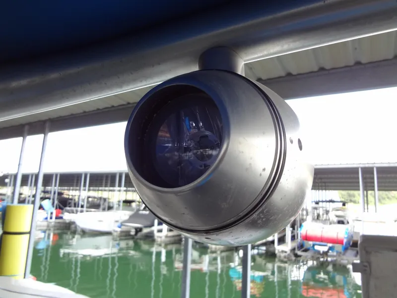 Slide: The Image of Close-up of a 2004 MasterCraft X-Star boat spotlight at a marina. - 31