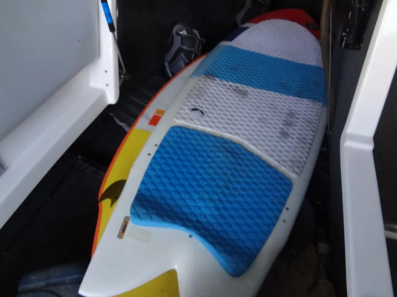Slide: The Image of Surfboard stored inside 2004 MasterCraft X-Star boat. - 35