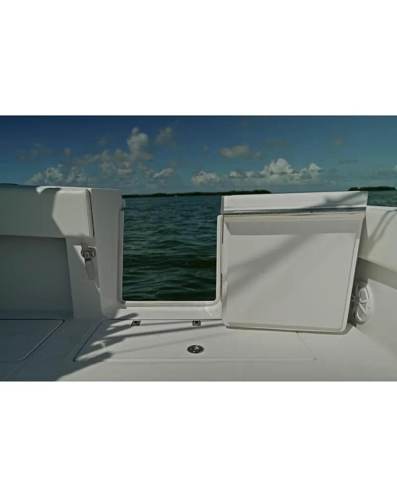 Slide: The Image of 2018 SeaHunter 39 Tournament boat, open deck view, ocean backdrop. - 15