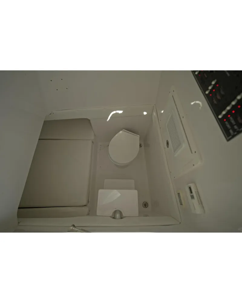 Slide: The Image of 2018 SeaHunter 39 Tournament boat interior with toilet and sink. - 18