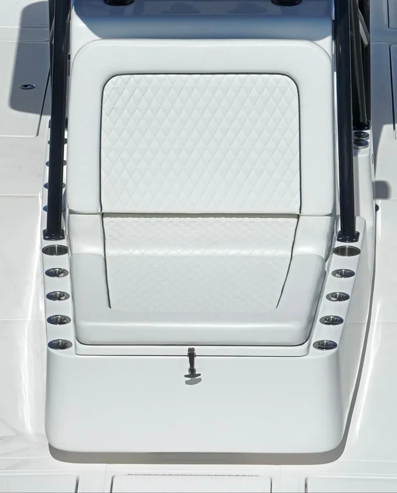 Slide: The Image of 2018 SeaHunter 39 Tournament boat seat with diamond-pattern upholstery and cup holders. - 21