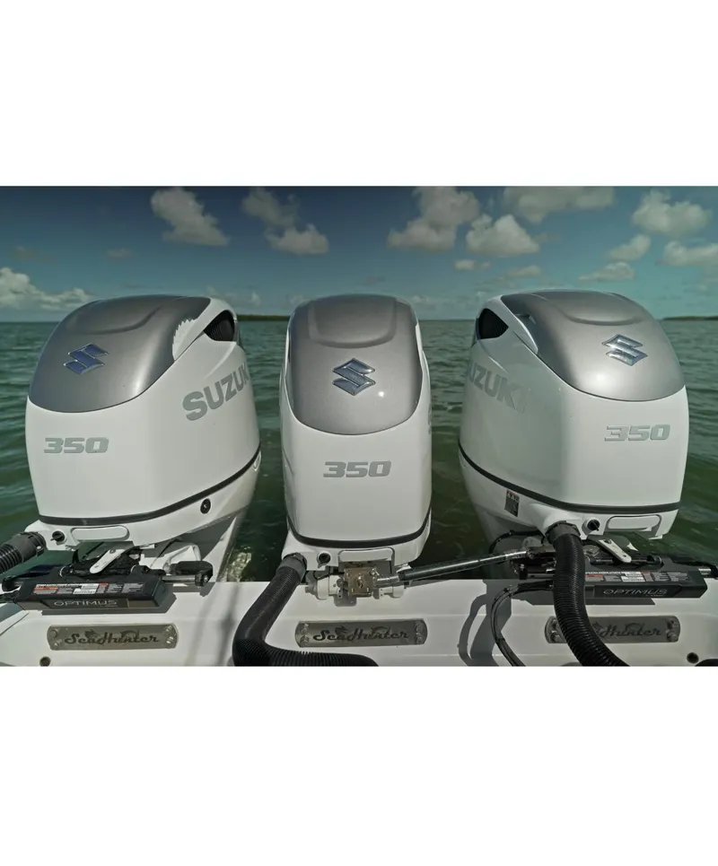 Slide: The Image of Triple Suzuki 350 outboard engines on 2018 SeaHunter 39 Tournament boat. - 25