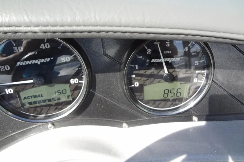 Slide: The Image of Dashboard of 2022 Sanger V237 S boat showing speed and RPM gauges. - 12