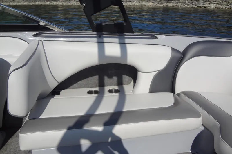 Slide: The Image of 2022 Sanger V237 S boat interior with white and gray seating. - 15