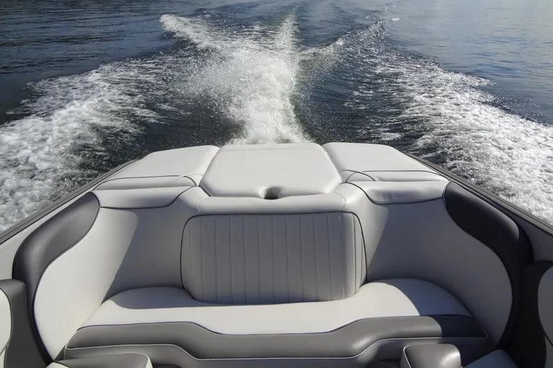 Slide: The Image of 2022 Sanger V237 S boat interior with wake trail on water. - 17