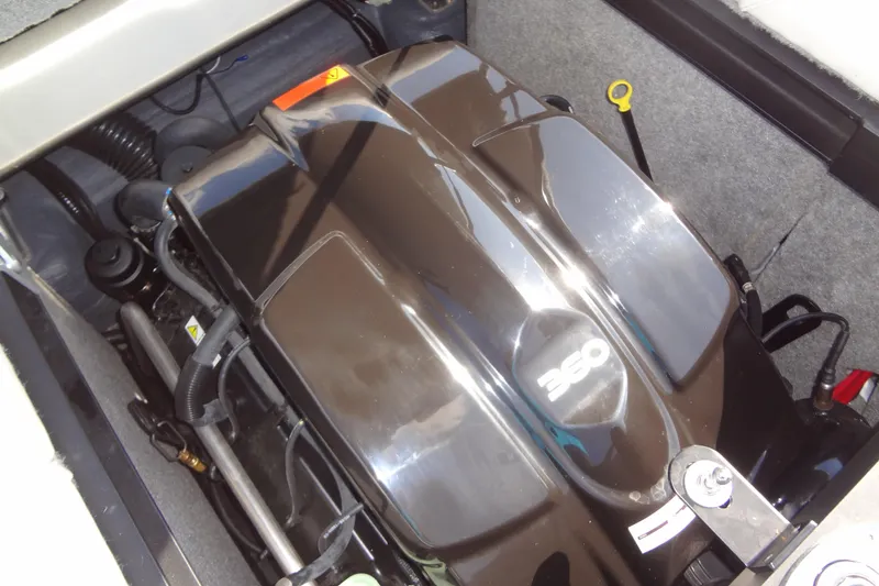 Slide: The Image of Engine compartment of a 2022 Sanger V237 S boat, featuring a 350 horsepower engine. - 21