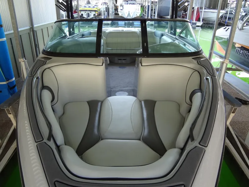 Slide: The Image of 2022 Sanger V237 S boat interior with plush seating and sleek design. - 26