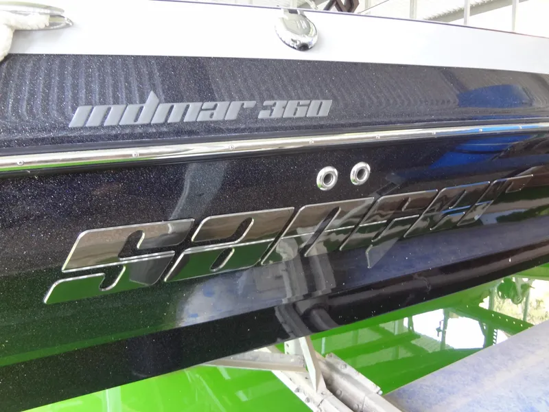 Slide: The Image of 2022 Sanger V237 S boat with Indmar 360 engine, side view. - 28