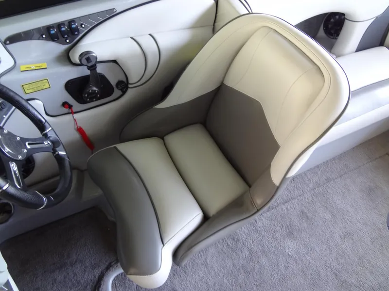 Slide: The Image of 2022 Sanger V237 S boat interior with gray and white seating. - 36