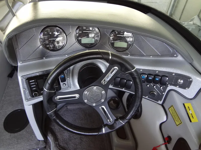 Slide: The Image of 2022 Sanger V237 S dashboard with steering wheel and instrument panel. - 38