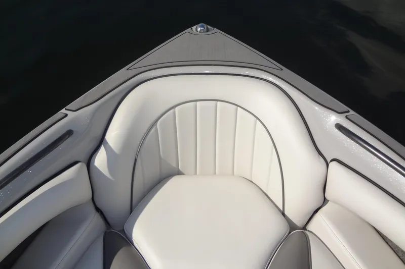Slide: The Image of Bow seating area of 2022 Sanger V237 S boat with white upholstery. - 5