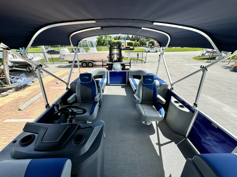 Slide: The Image of 2024 Bennington 22 SSR-SPS pontoon boat with spacious seating and modern design. - 13