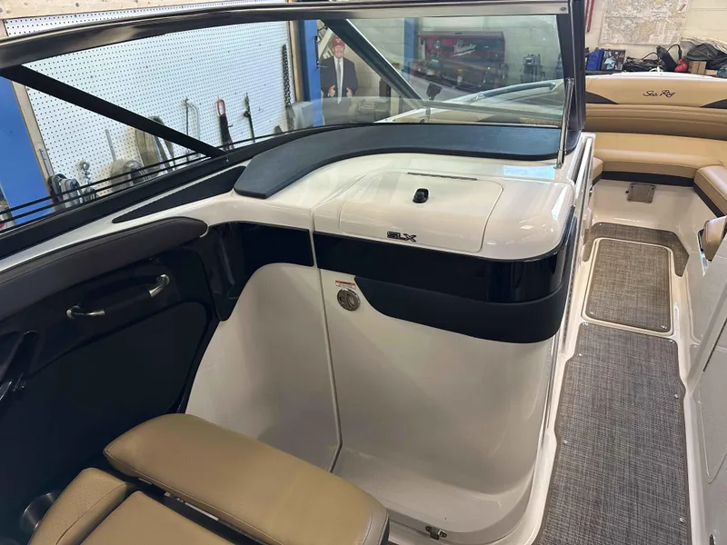 Slide: The Image of 2025 Sea Ray 280SLX boat interior with sleek design and comfortable seating. - 10