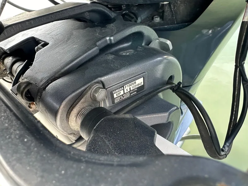 Slide: The Image of Close-up of a 2019 Key West 244 Center Console boat engine component. - 17