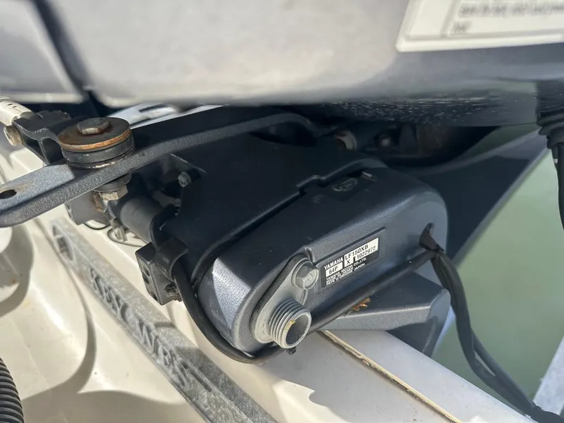 Slide: The Image of Close-up of a 2019 Key West 244 Center Console boat engine component. - 18